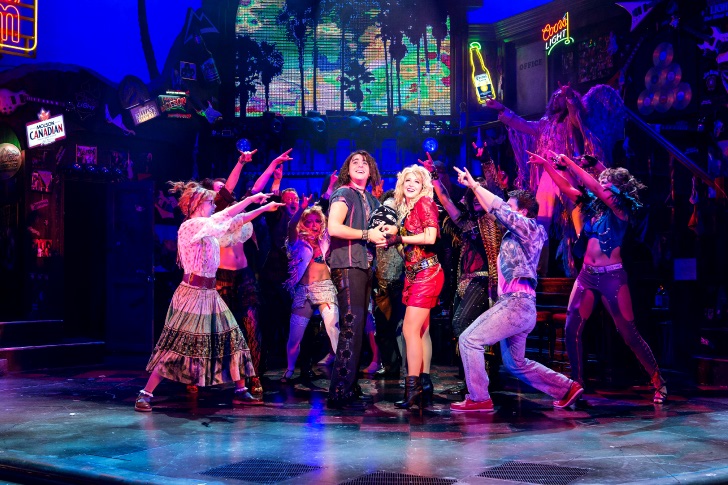 picture of the cast of Rock of Ages behind Drew and Sherrie